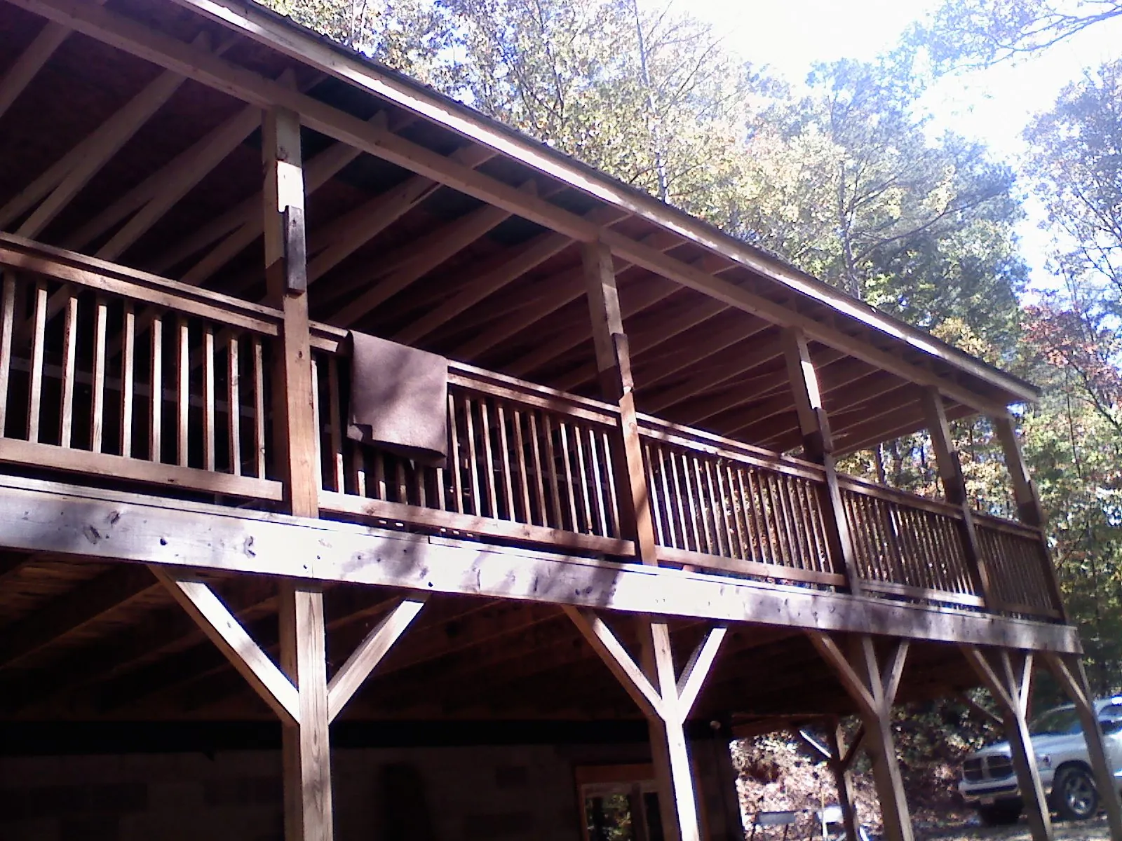 Timber framing under a new elevated porch and deck — Roof Leak Repair in Valdosta by Roofing Brothers